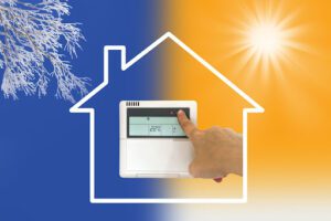 Photo of finger changing the thermostat overlayed on top of a house drawing with winter and summer both depicted in the background.