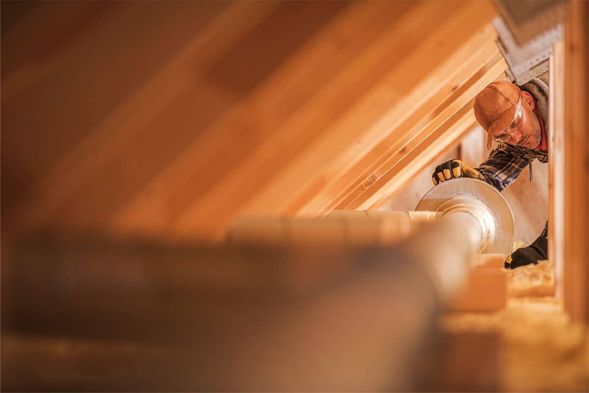 Attic ductwork in a Summerlin home where 140-degree summer heat warms the cooled air
