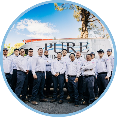 Pure Plumbing team standing in front of service van, trusted plumbing and HVAC company in Las Vegas
