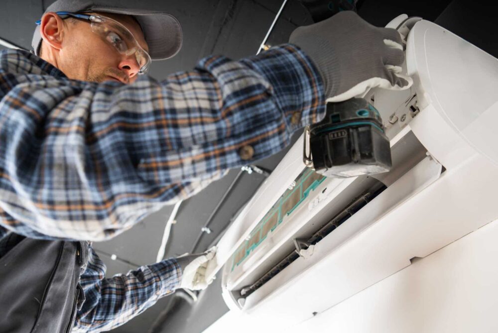 Technician Repairing Air Conditioning System in Paradise LV